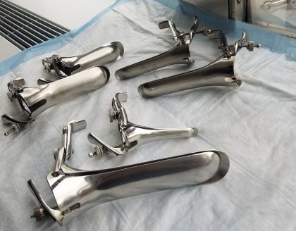 Different size speculums on counter