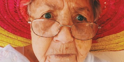 older aged woman with glasses on